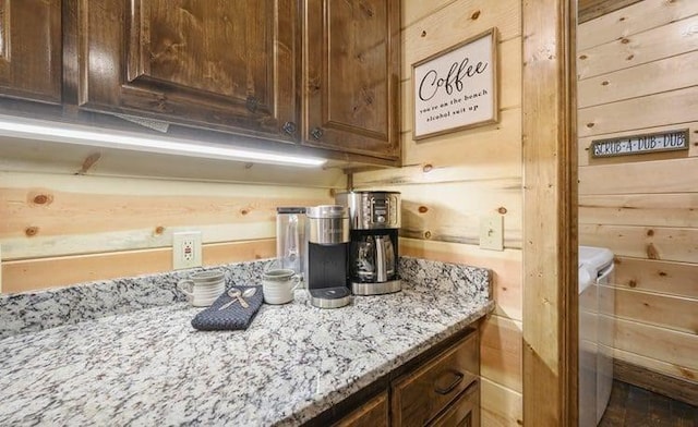 1723 Pine Hills Rd, Broken Bow, OK 74728 - kitchen view of light stone countertops and dark brown cabinetry