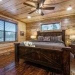 1723 Pine Hills Rd, Broken Bow, OK 74728 - bedroom with brick flooring