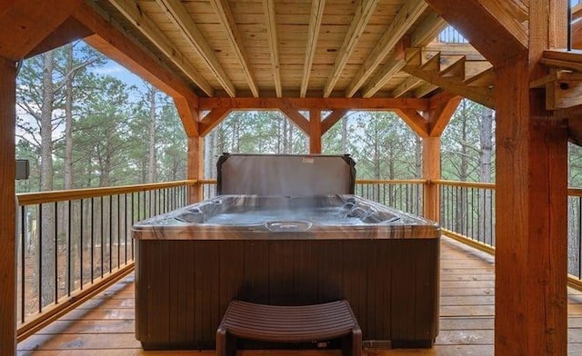 1723 Pine Hills Rd, Broken Bow, OK 74728 - wooden deck with a hot tub