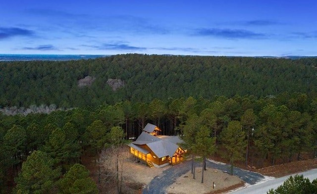 1723 Pine Hills Rd, Broken Bow, OK 74728 - view from above of property featuring a heavily wooded area