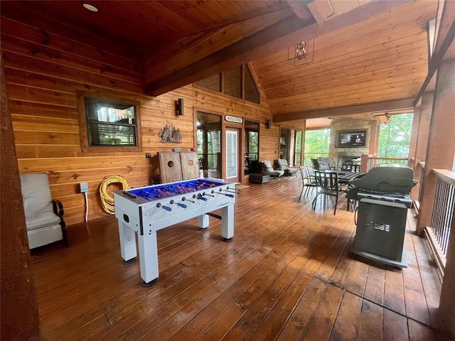 1723 Pine Hills Rd, Broken Bow, OK 74728 - recreation room with wood ceiling, wood-type flooring, wood walls, and vaulted ceiling