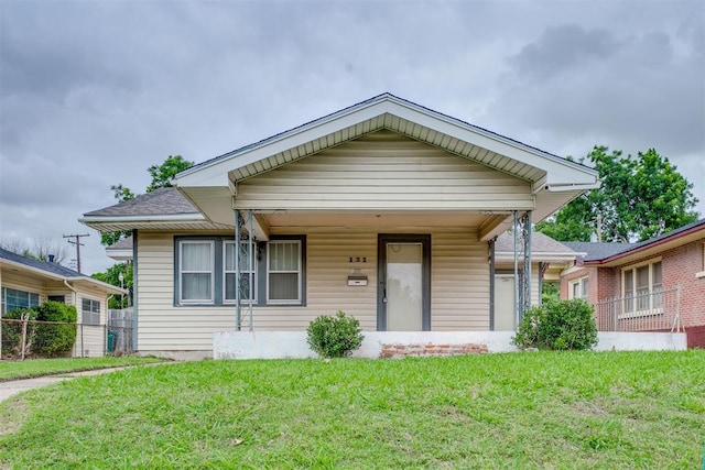 121 NW 26th St, Oklahoma City, OK 73103 - view of front facade with covered porch