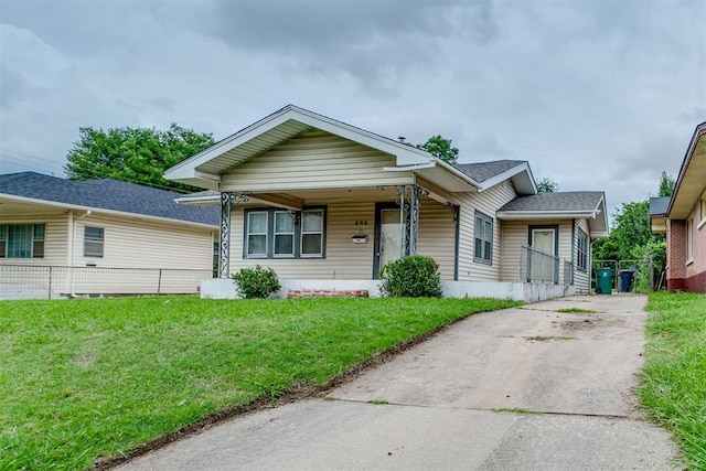 121 NW 26th St, Oklahoma City, OK 73103 - bungalow-style house with concrete driveway
