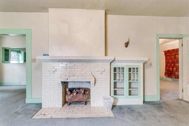 121 NW 26th St, Oklahoma City, OK 73103 - detailed view of carpet floors and a brick fireplace