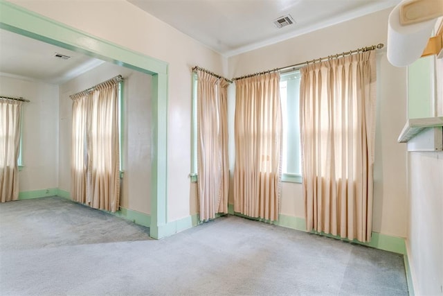 121 NW 26th St, Oklahoma City, OK 73103 - unfurnished room with carpet flooring and ornamental molding