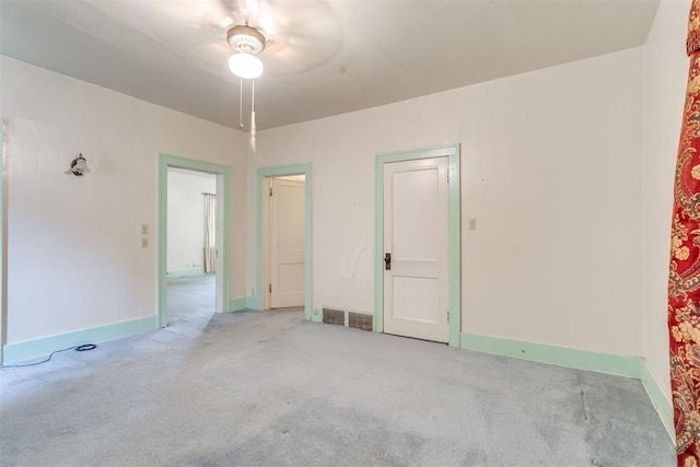 121 NW 26th St, Oklahoma City, OK 73103 - carpeted empty room with ceiling fan and baseboards