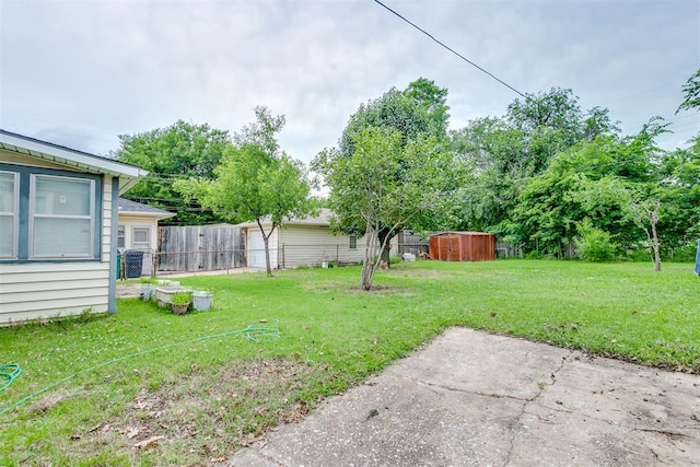 121 NW 26th St, Oklahoma City, OK 73103 - view of yard featuring a storage unit