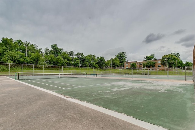121 NW 26th St, Oklahoma City, OK 73103 - view of tennis court featuring view of scattered trees