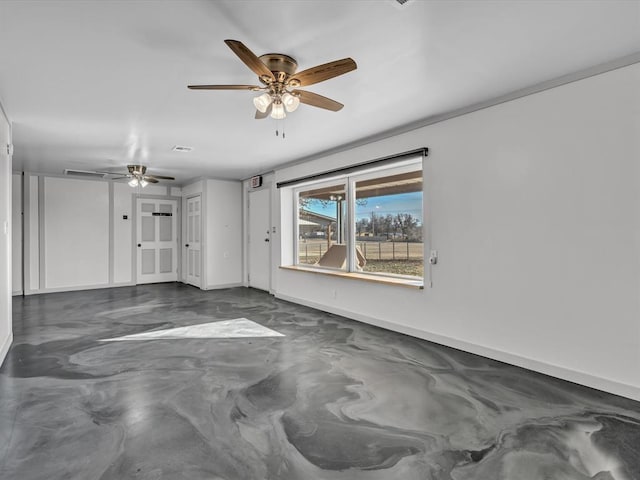 500 W Simpson Rd, Edmond, OK 73034 - unfurnished living room featuring ceiling fan and finished concrete floors