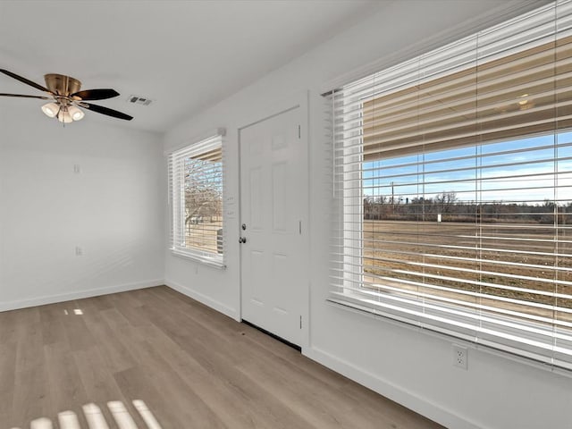 500 W Simpson Rd, Edmond, OK 73034 - entryway with wood finished floors and a ceiling fan