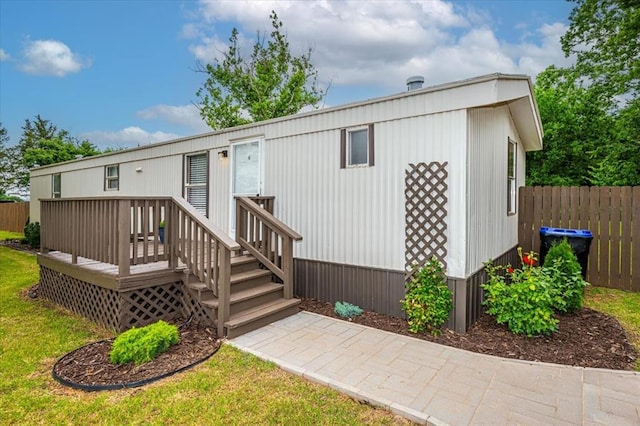 6550 N Indian Meridian Rd, Coyle, OK 73027 - back of house with a wooden deck