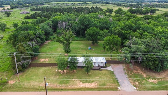 6550 N Indian Meridian Rd, Coyle, OK 73027 - aerial view of property and surrounding area with a heavily wooded area