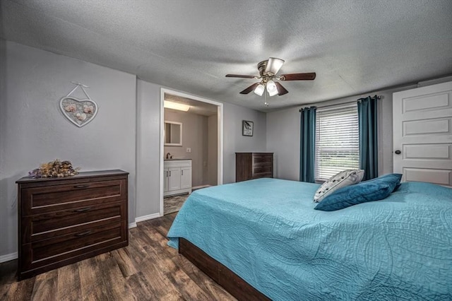 6550 N Indian Meridian Rd, Coyle, OK 73027 - bedroom featuring wood finished floors, a textured ceiling, connected bathroom, and ceiling fan