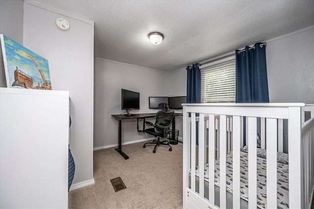 6550 N Indian Meridian Rd, Coyle, OK 73027 - carpeted bedroom with a textured ceiling and an office area
