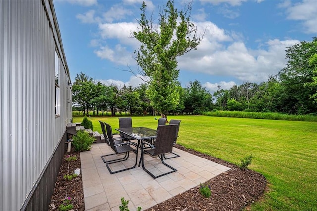 6550 N Indian Meridian Rd, Coyle, OK 73027 - view of patio featuring outdoor dining space and view of scattered trees