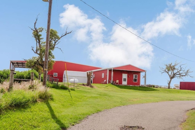 12223 N 2040th Rd, Sentinel, OK 73664 - view of yard featuring a pole building and an outbuilding