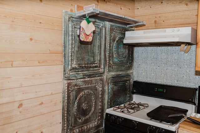 12223 N 2040th Rd, Sentinel, OK 73664 - kitchen featuring gas range oven and under cabinet range hood