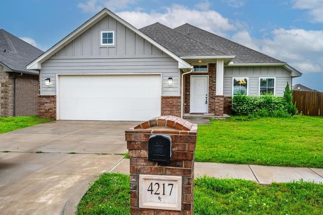 4217 NW 151st St, Edmond, OK 73013 - craftsman-style house featuring board and batten siding, concrete driveway, a shingled roof, an attached garage, and brick siding
