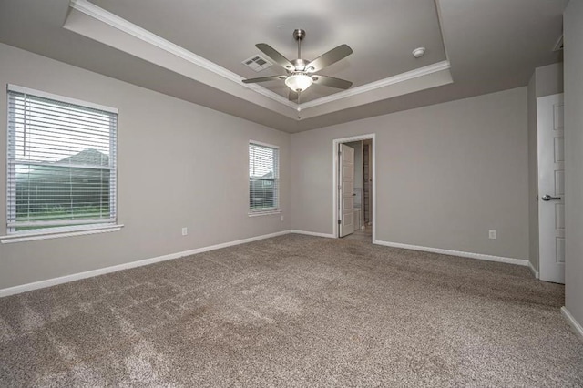 4217 NW 151st St, Edmond, OK 73013 - unfurnished room with a raised ceiling, crown molding, ceiling fan, and carpet flooring
