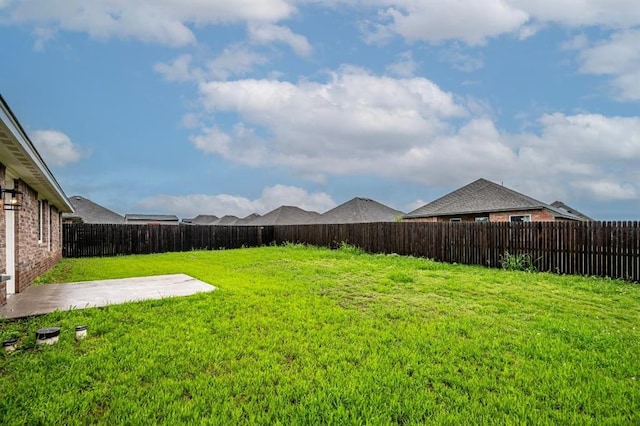 4217 NW 151st St, Edmond, OK 73013 - fenced backyard with a patio
