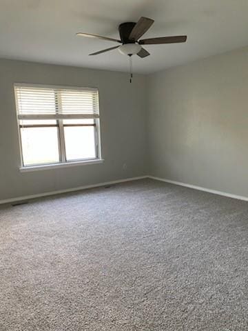 7700 139th St, Noble, OK 73068 - carpeted empty room with a ceiling fan and baseboards