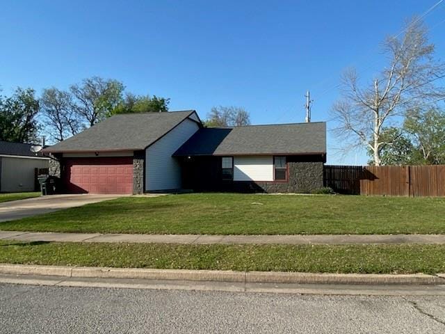 7700 139th St, Noble, OK 73068 - ranch-style house with an attached garage and concrete driveway