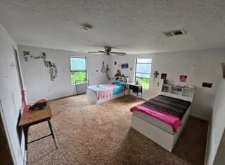 7700 139th St, Noble, OK 73068 - carpeted bedroom featuring multiple windows and ceiling fan