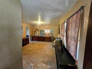 7700 139th St, Noble, OK 73068 - bedroom with a textured ceiling and carpet flooring