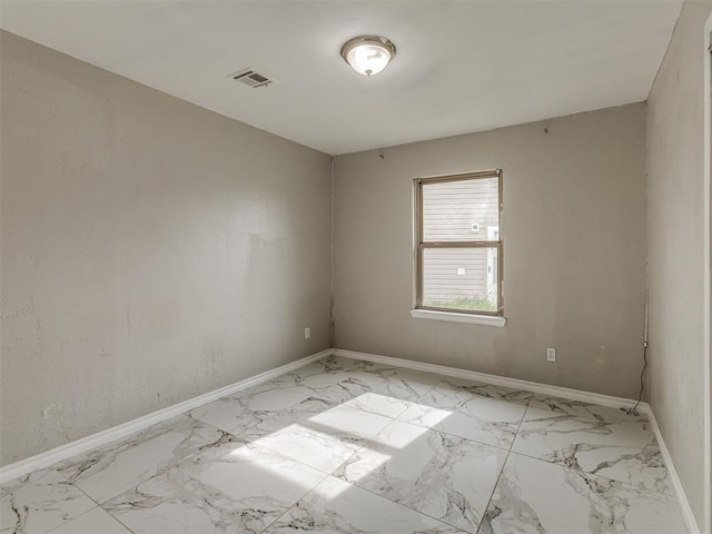 2837 SW 63rd St, Oklahoma City, OK 73159 - empty room with light marble finish flooring and baseboards