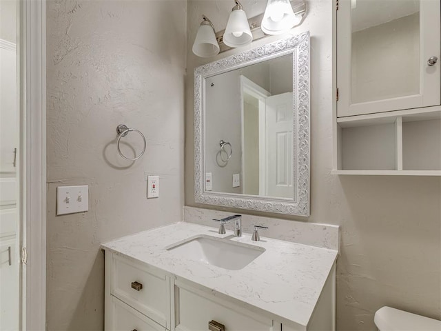 2837 SW 63rd St, Oklahoma City, OK 73159 - bathroom with vanity and toilet