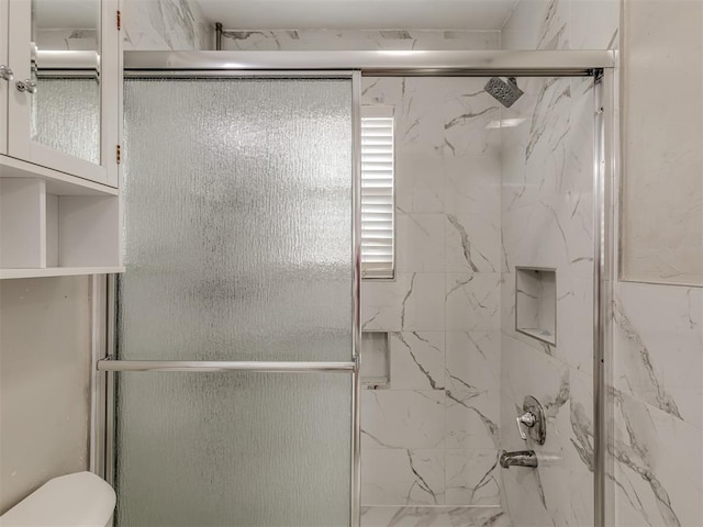 2837 SW 63rd St, Oklahoma City, OK 73159 - full bathroom featuring a marble finish shower and toilet