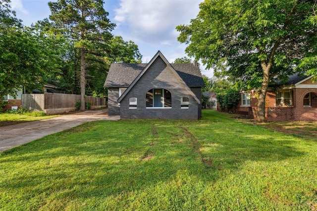1828 NW 40th St, Oklahoma City, OK 73118 - view of front of house with brick siding, concrete driveway, and roof with shingles