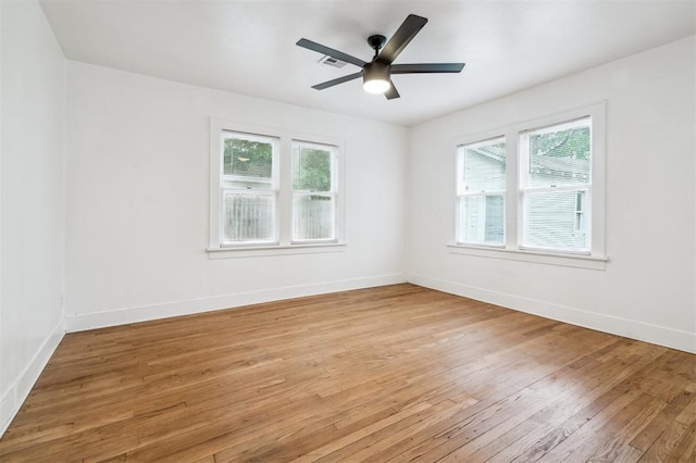 1828 NW 40th St, Oklahoma City, OK 73118 - spare room featuring light wood finished floors and ceiling fan
