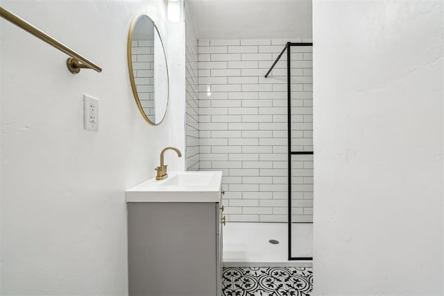 1828 NW 40th St, Oklahoma City, OK 73118 - full bath featuring tiled shower, vanity, and tile patterned flooring