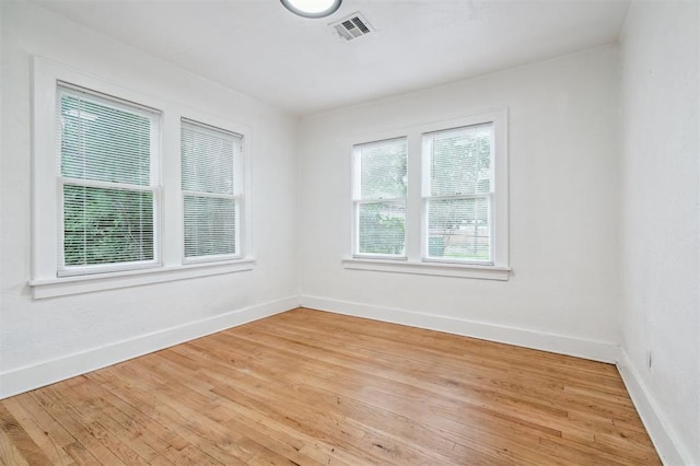 1828 NW 40th St, Oklahoma City, OK 73118 - unfurnished room featuring baseboards and wood finished floors