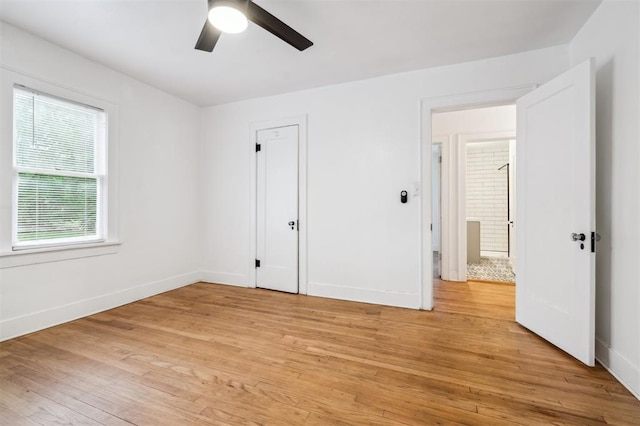 1828 NW 40th St, Oklahoma City, OK 73118 - unfurnished bedroom featuring light wood-style floors and a ceiling fan