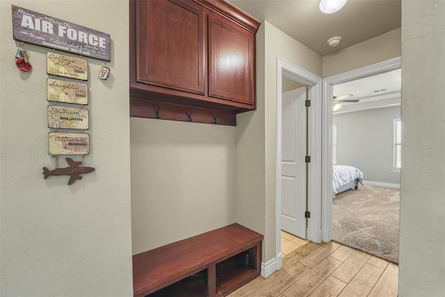 1101 Northridge Blvd, Altus, OK 73521 - mudroom featuring light wood-style flooring and a ceiling fan