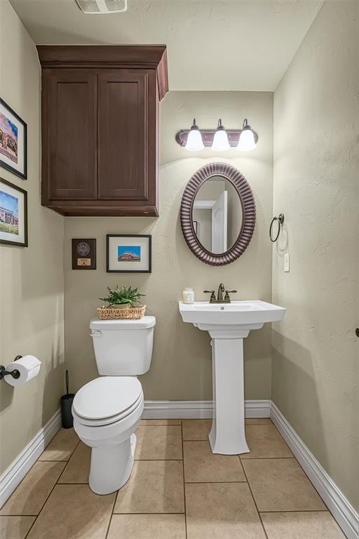1101 Northridge Blvd, Altus, OK 73521 - bathroom with toilet and tile patterned flooring