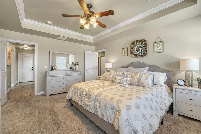 1101 Northridge Blvd, Altus, OK 73521 - bedroom with a raised ceiling, light carpet, crown molding, and ceiling fan