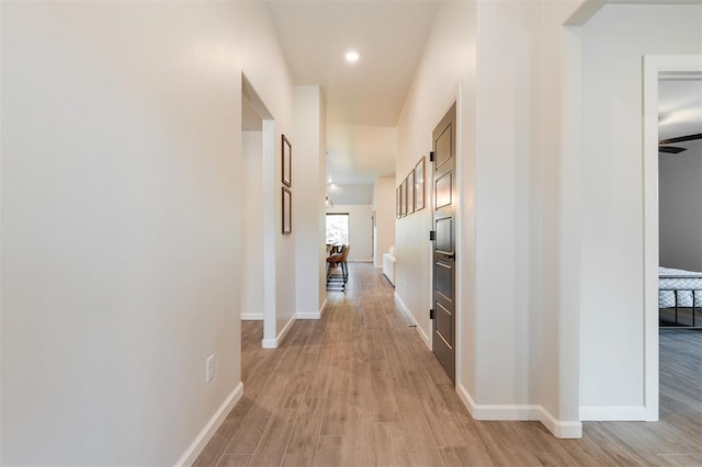 16101 Villa Valeria Way, Edmond, OK 73013 - hallway featuring light wood-style flooring and recessed lighting