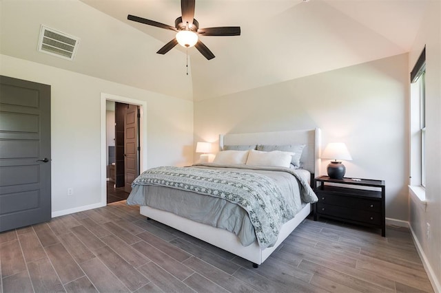 16101 Villa Valeria Way, Edmond, OK 73013 - bedroom with wood finished floors, vaulted ceiling, multiple windows, and ceiling fan