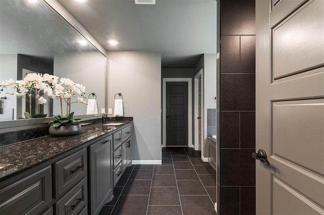 16101 Villa Valeria Way, Edmond, OK 73013 - bathroom with vanity, tile patterned flooring, recessed lighting, and a bath