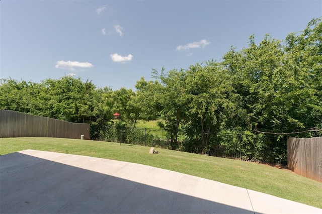 16101 Villa Valeria Way, Edmond, OK 73013 - fenced backyard featuring a patio