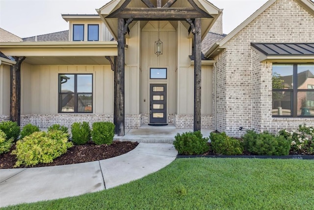 1690 Shaylee Ln, Choctaw, OK 73020 - entrance to property featuring brick siding, a lawn, roof with shingles, and board and batten siding
