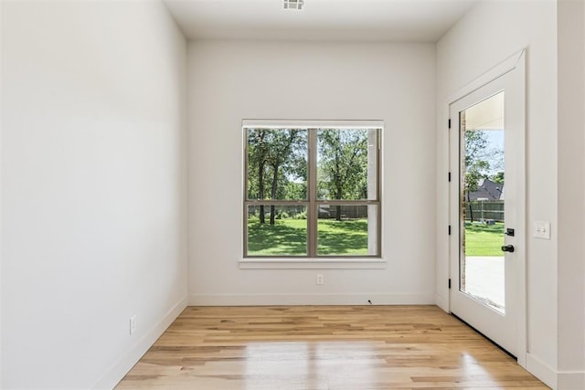 1690 Shaylee Ln, Choctaw, OK 73020 - doorway featuring light wood finished floors