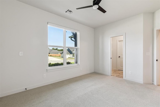 1690 Shaylee Ln, Choctaw, OK 73020 - unfurnished bedroom featuring light carpet and ceiling fan