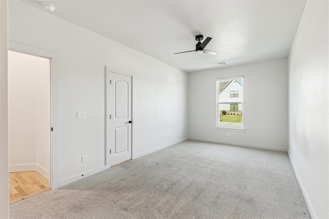 1690 Shaylee Ln, Choctaw, OK 73020 - carpeted spare room featuring a smoke detector and ceiling fan