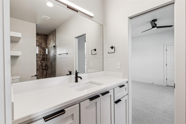 1690 Shaylee Ln, Choctaw, OK 73020 - full bathroom featuring vanity, a tile shower, and a ceiling fan