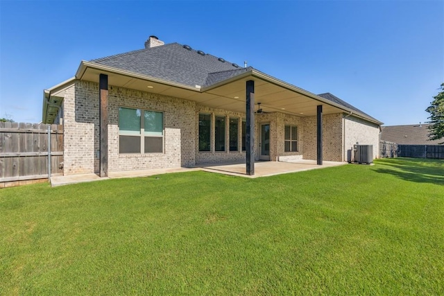 1690 Shaylee Ln, Choctaw, OK 73020 - rear view of property featuring brick siding, ceiling fan, a patio, a chimney, and a shingled roof