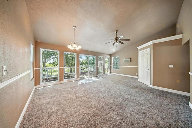 14500 Billy Dr, Edmond, OK 73034 - unfurnished living room with vaulted ceiling, ceiling fan, carpet floors, a chandelier, and a textured ceiling